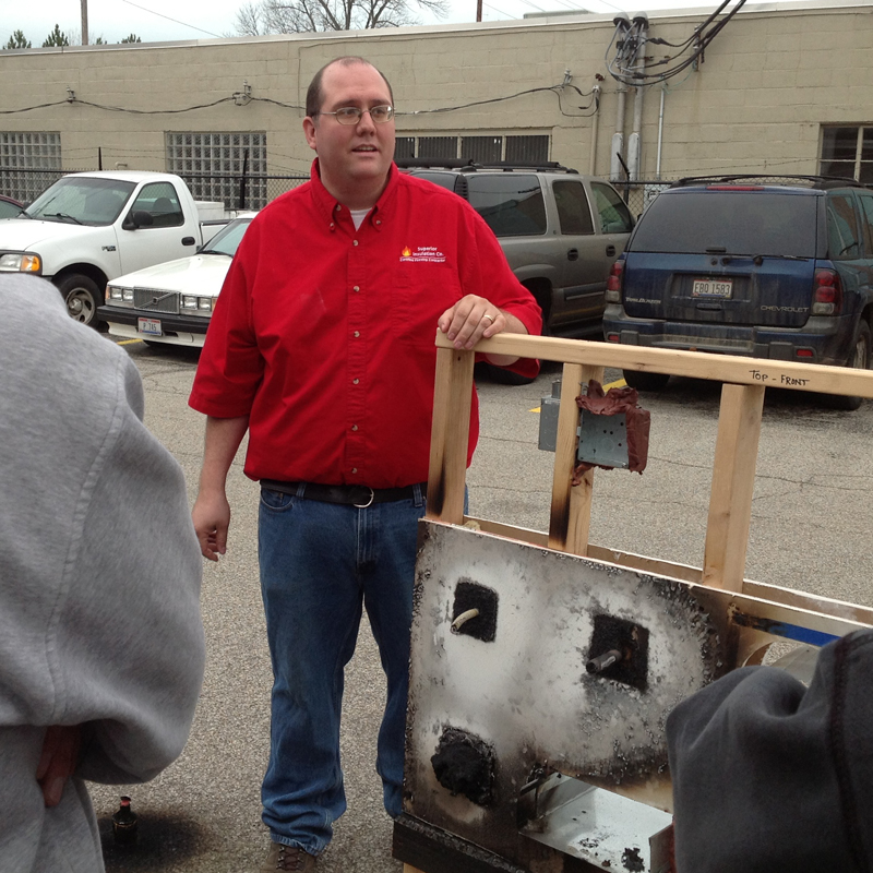 Firestopping Training showing a burned up mockup and the effects of proper sealing